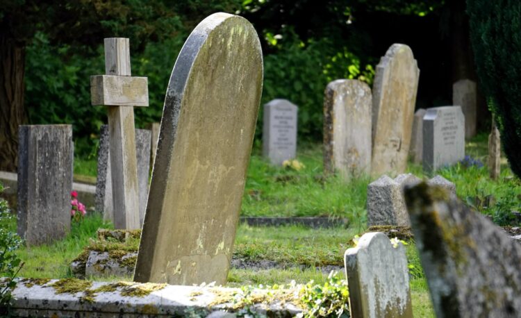 close up photography of concrete tombstones